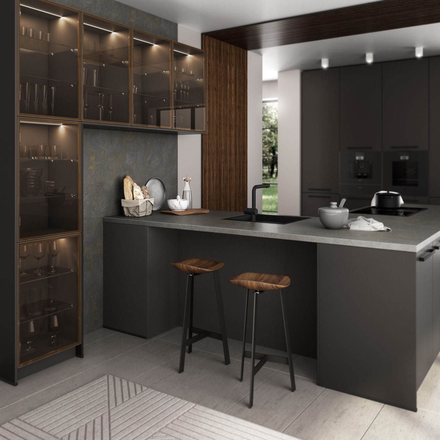 Cuisine aux façades métalliques bronze et vitrines éclairées